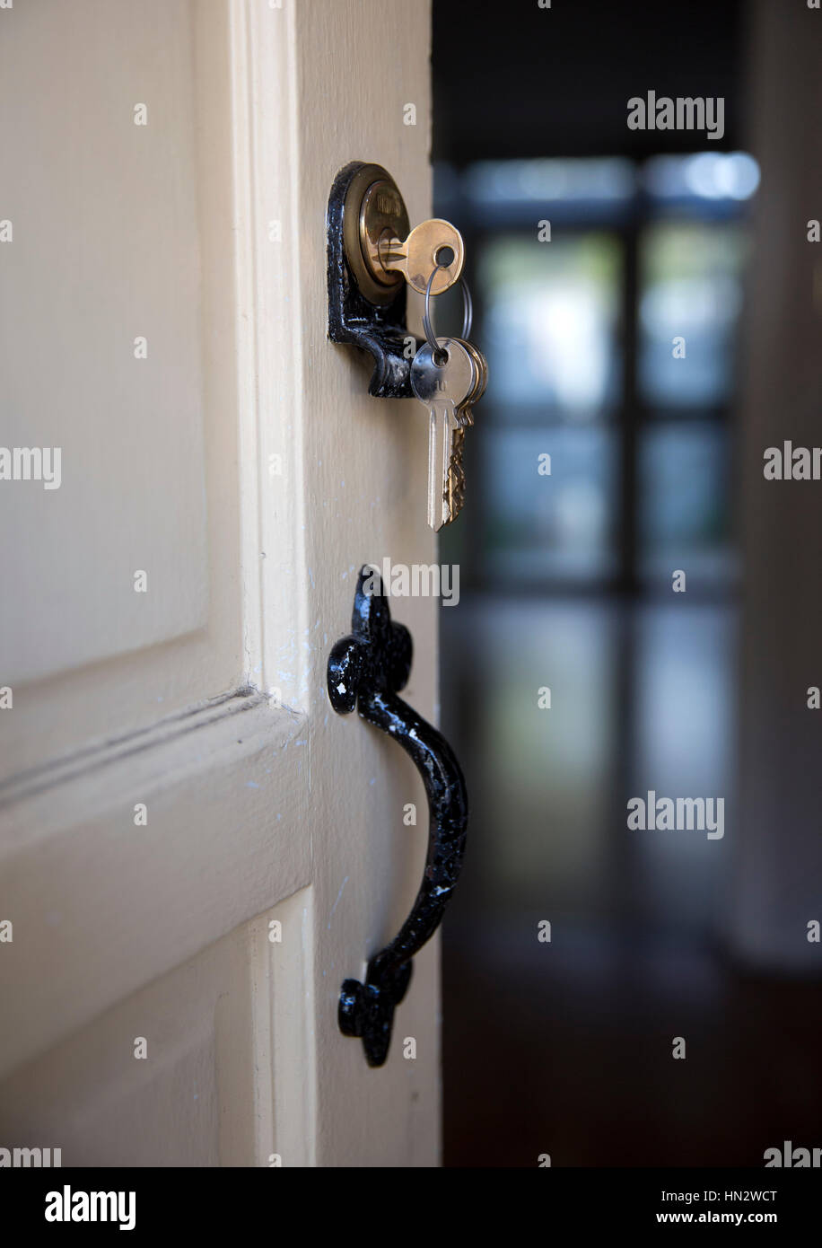 A set of house keys are seen in a lock on the front door to a house ... A set of house keys are seen in a lock on the front door to a house ...