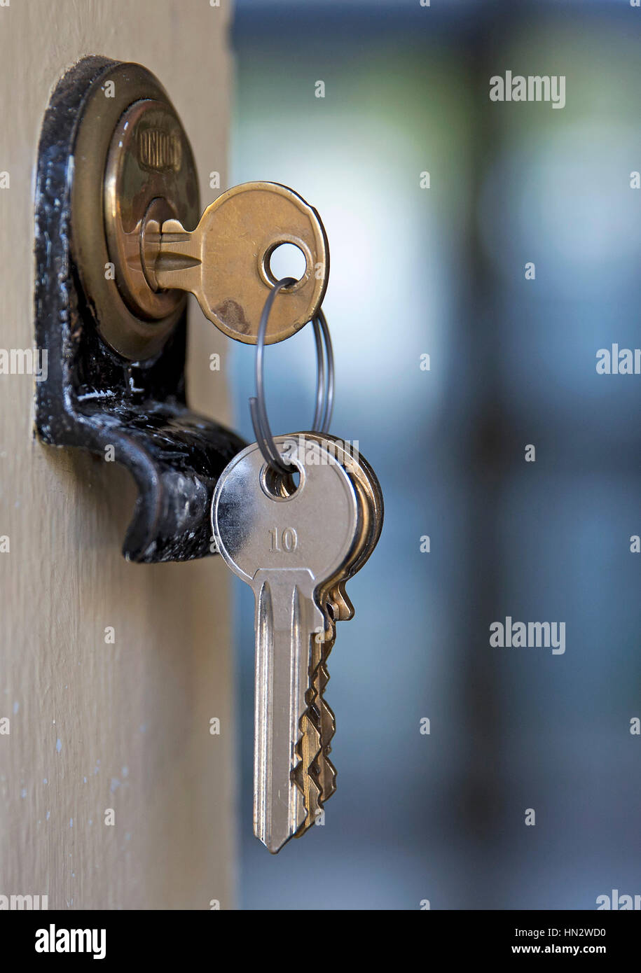 A set of house keys are seen in a lock on the front door to a house ... A set of house keys are seen in a lock on the front door to a house ...