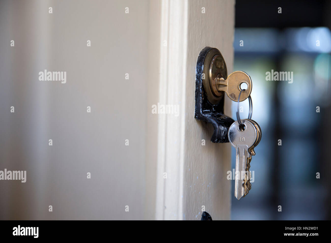 A set of house keys are seen in a lock on the front door to a house ... A set of house keys are seen in a lock on the front door to a house ...