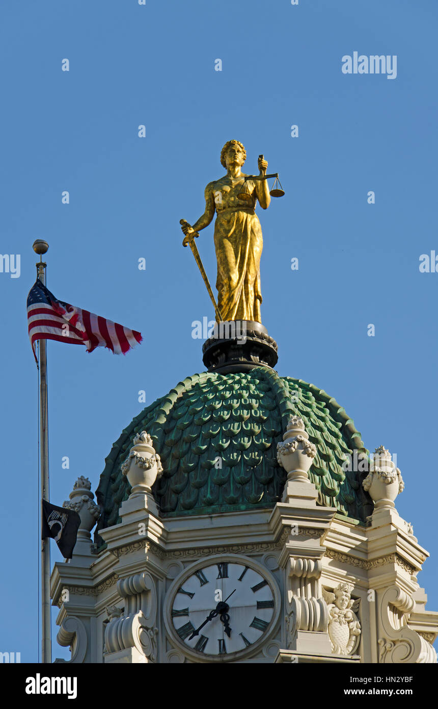 Lady Justice statue made of bronze on top of the Brooklyn Borough Hall in New York. Stock Photo