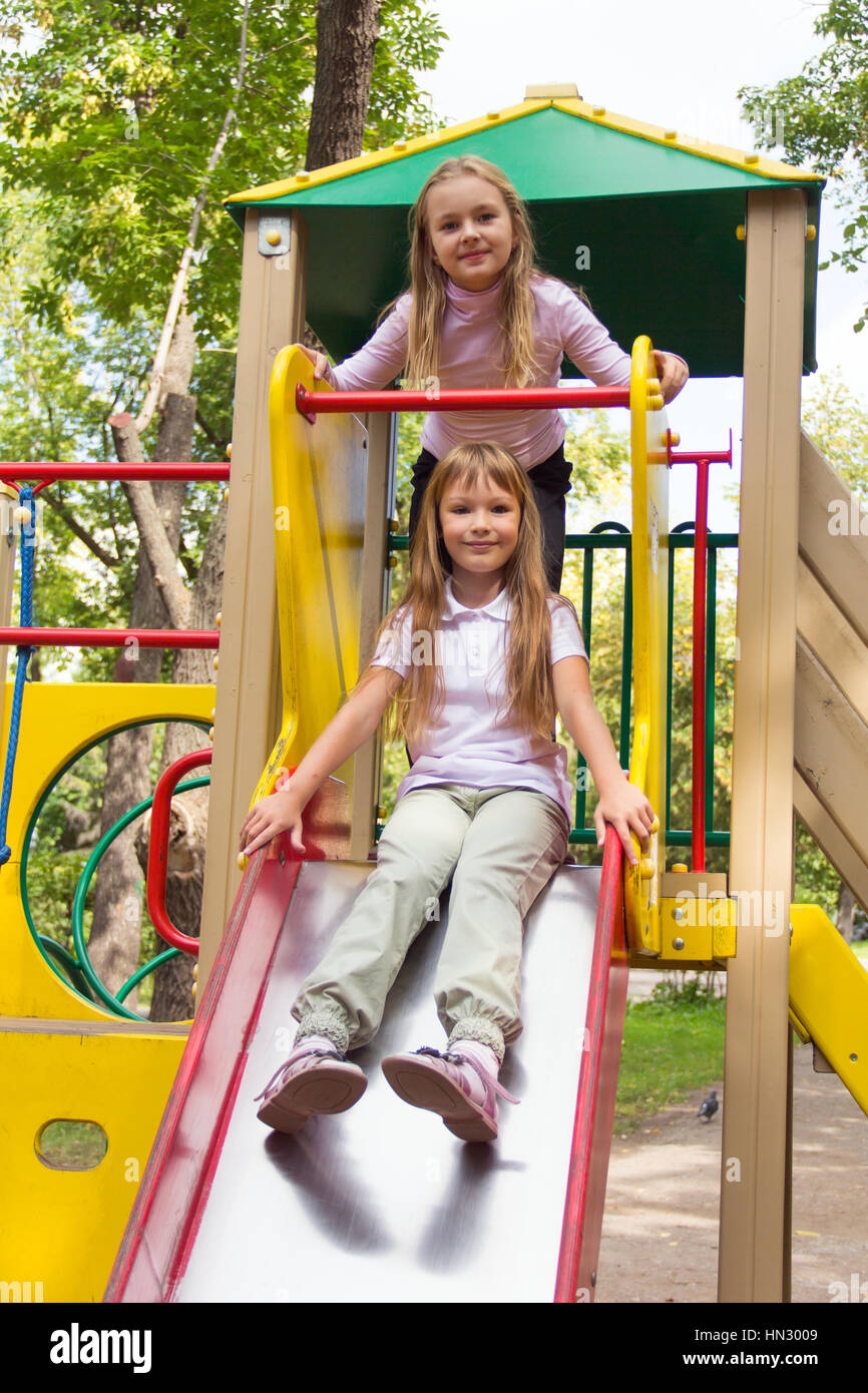 Photo of two playing girls in summer Stock Photo - Alamy