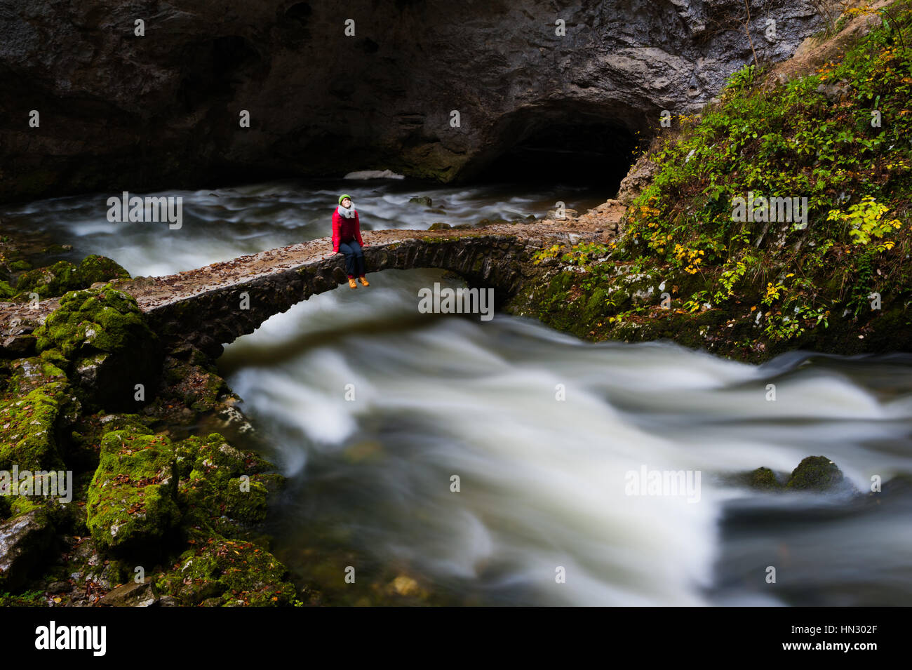 Female looking over bridge hi-res stock photography and images - Alamy