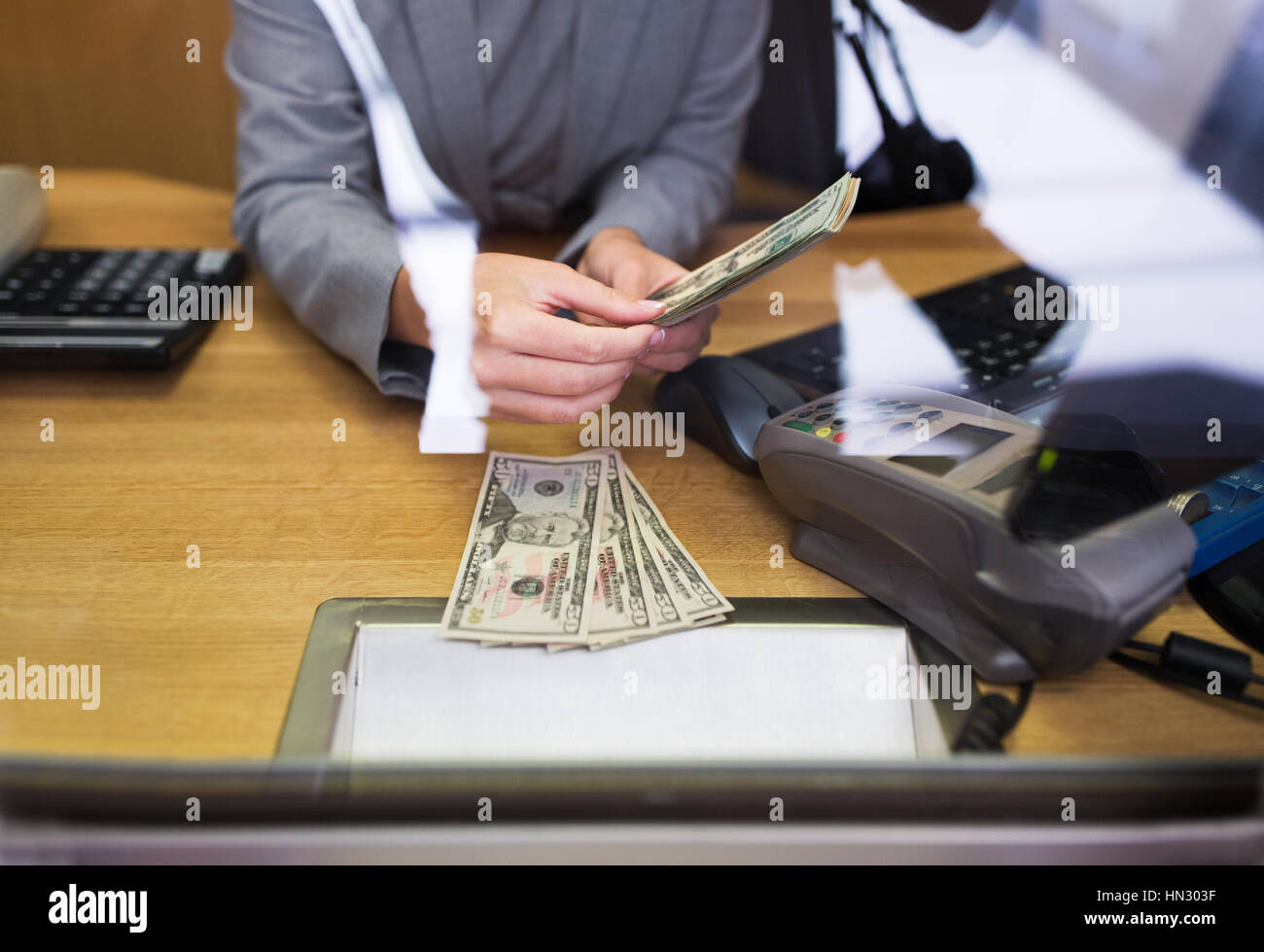Cashier Counting Cash Stock Photos & Cashier Counting Cash Stock Images