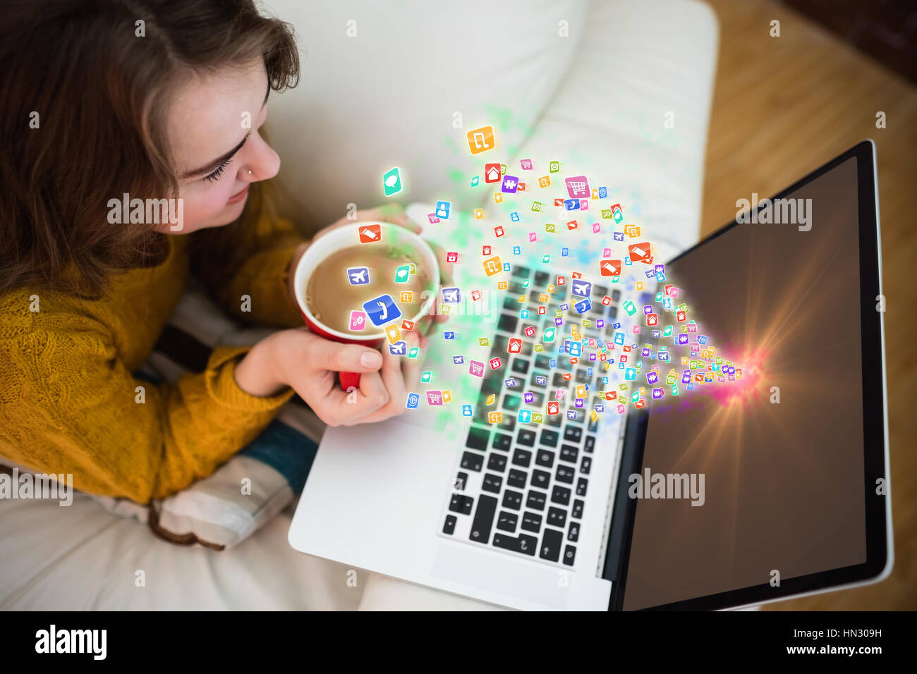 Colourful computer applications against smiling pretty woman using ...