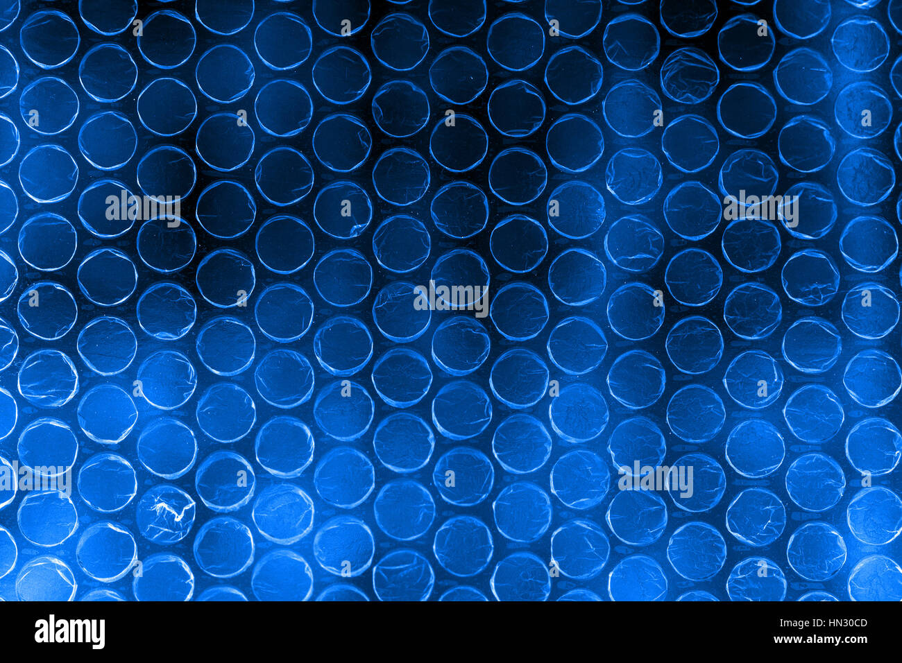 Plastic polymer bubble wrap in high contrast vivid Stock Photo