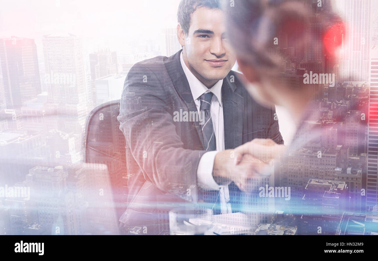 Manager interviewing a female applicant in his office Stock Photo