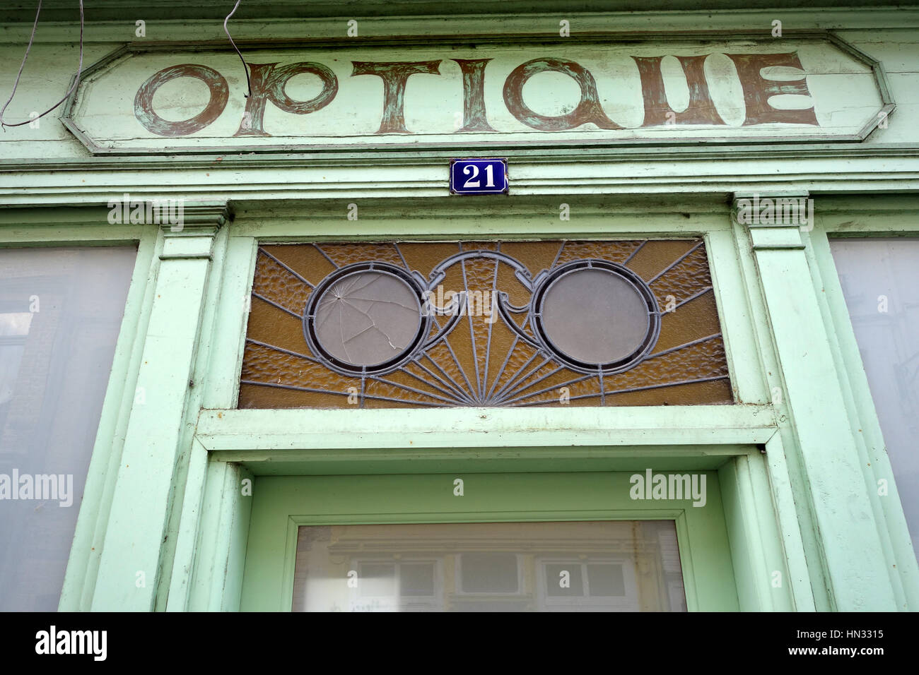 Old french opticians shop logo sign Optique in France Stock Photo