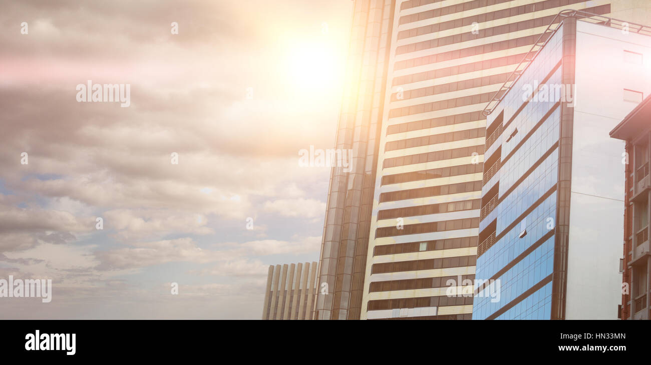 Sky against view of modern glass office building Stock Photo - Alamy