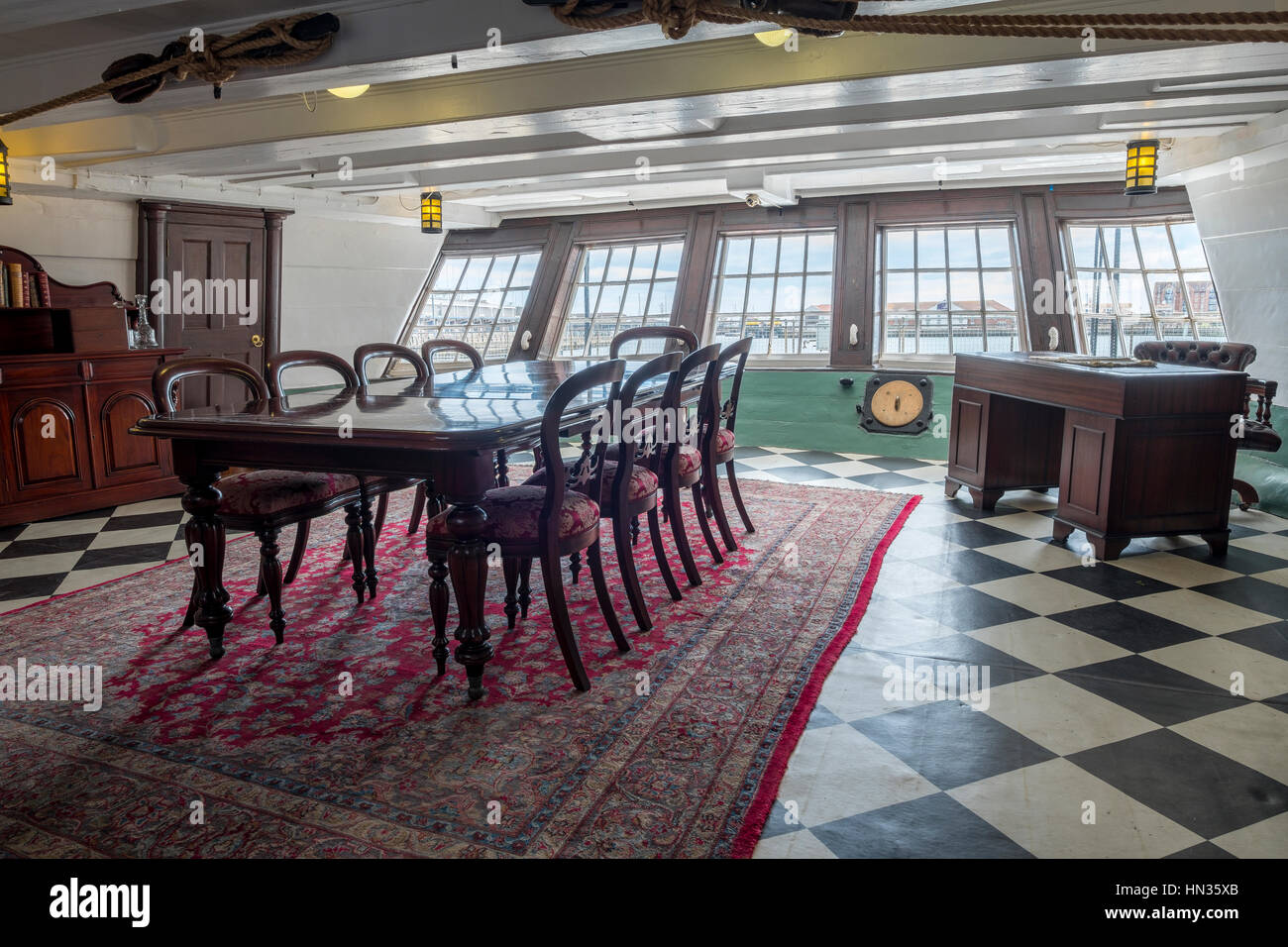 The wardroom of an early 19th century frigate. Stock Photo