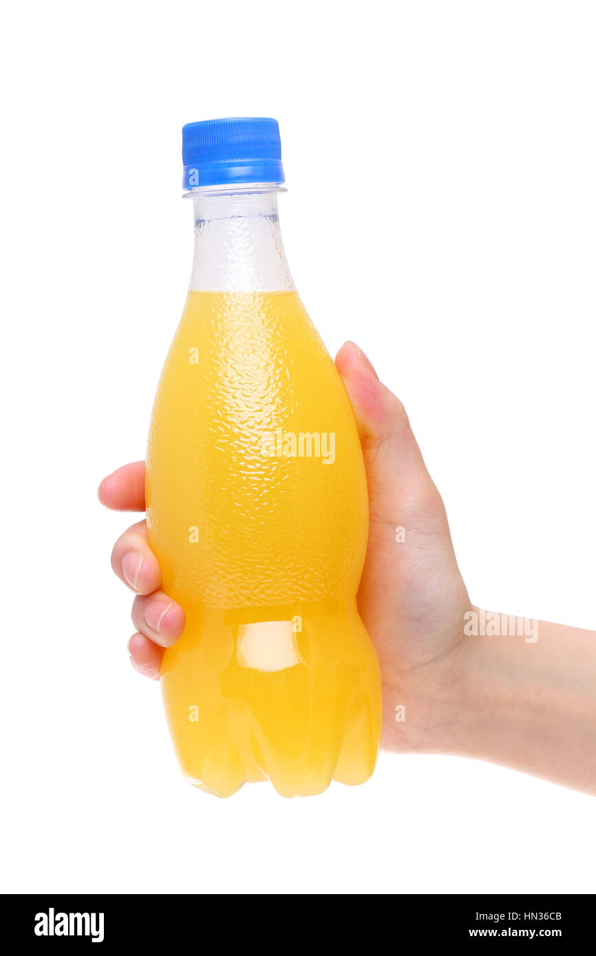 hand holding plastic bottle of juice isolated on white background Stock
