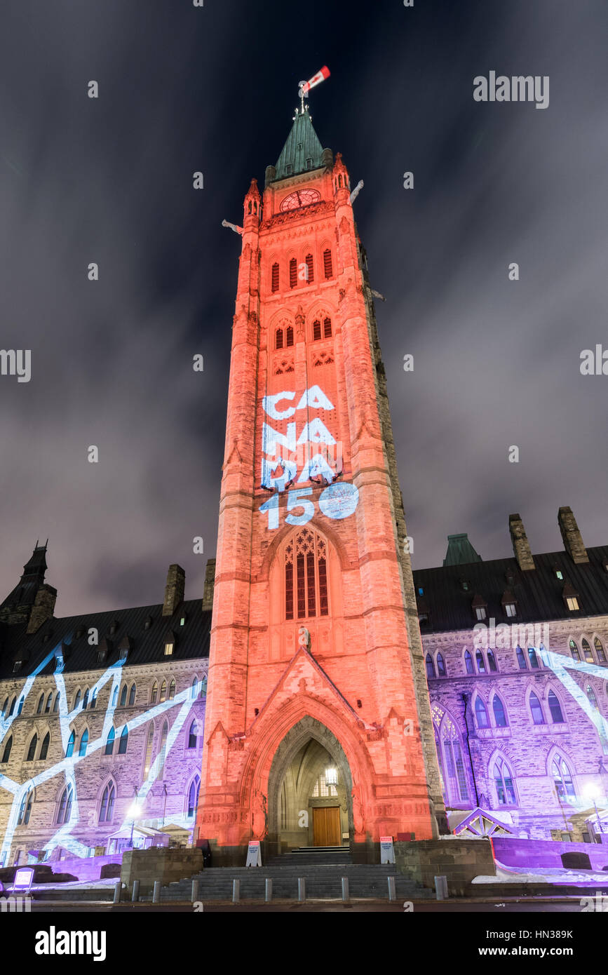 Winter holiday light show projected at night on the Canadian House of Parliament to celebrate the 150th Anniversary of Confederation of Canada in Otta Stock Photo
