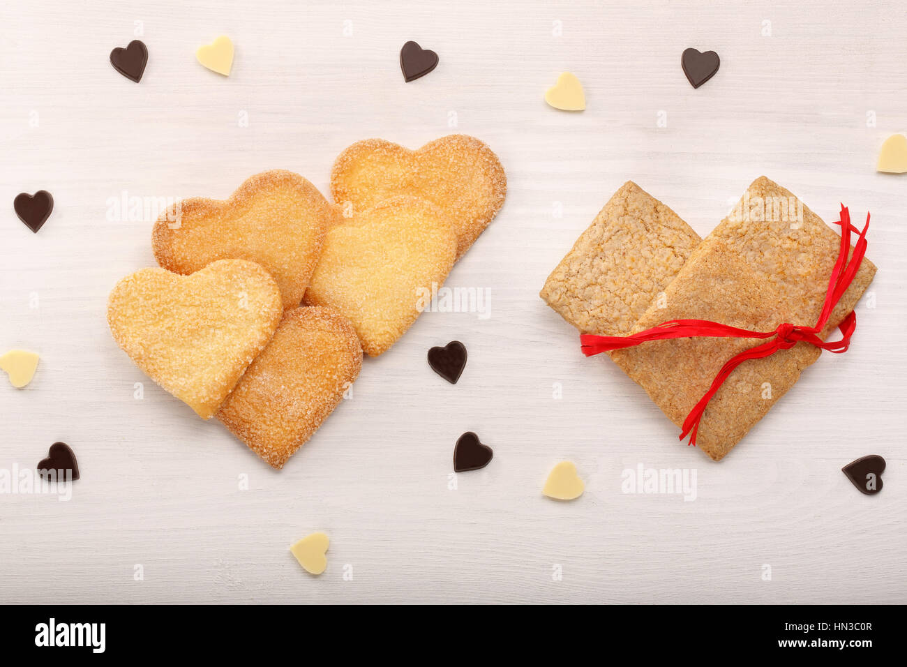 Delicious crunchy cookie in hearts shapes on Valentines Day Stock Photo