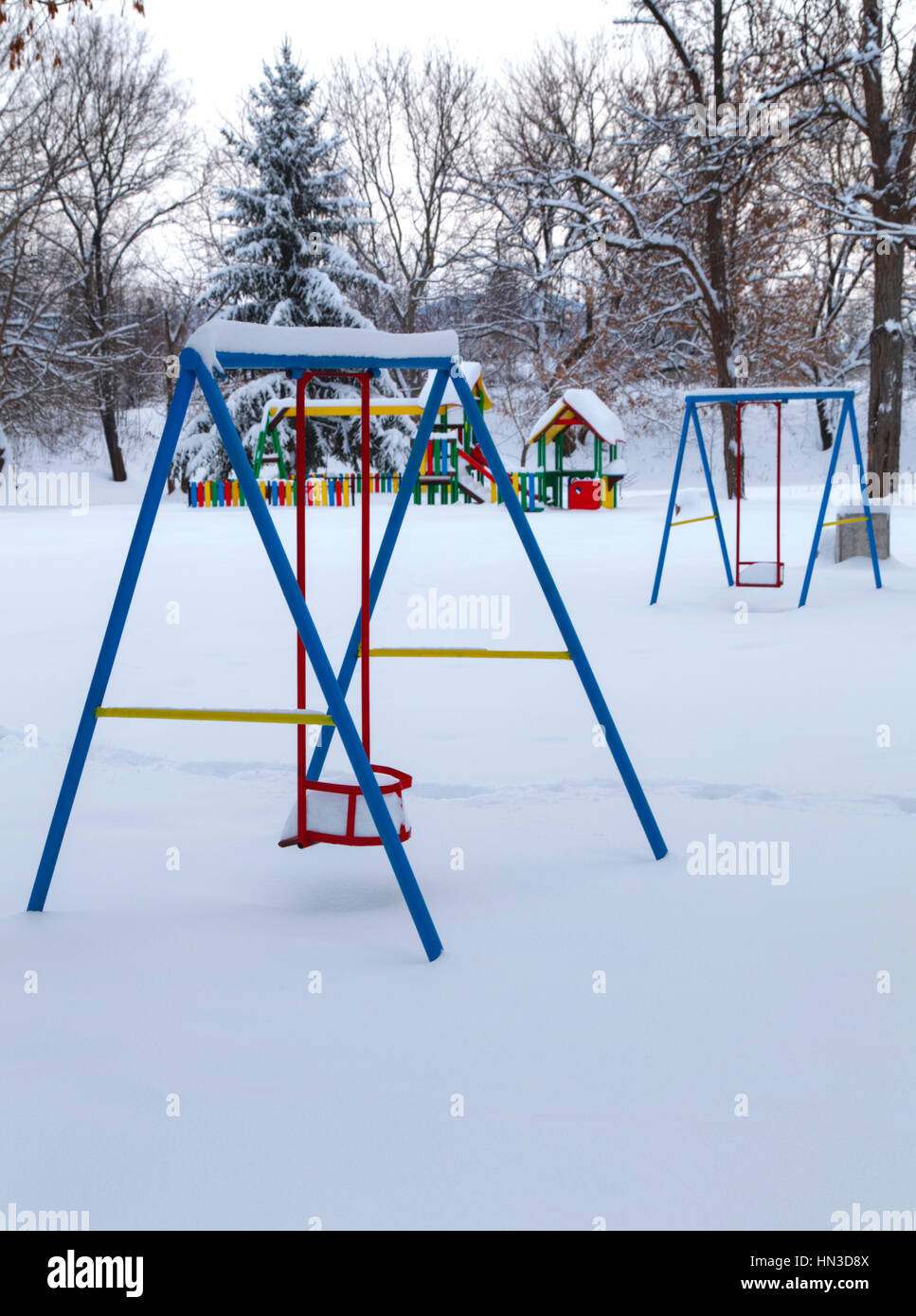 Children's playground covered with snow in winter Stock Photo - Alamy