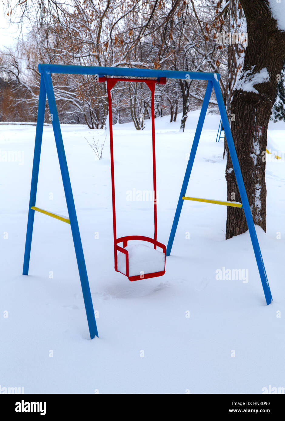 Children's playground covered with snow in winter Stock Photo - Alamy