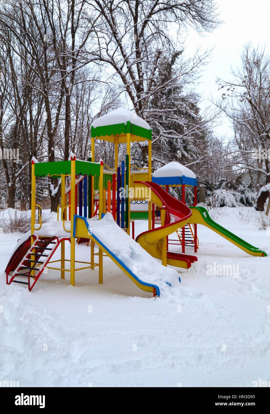 Children's playground covered with snow in winter Stock Photo - Alamy