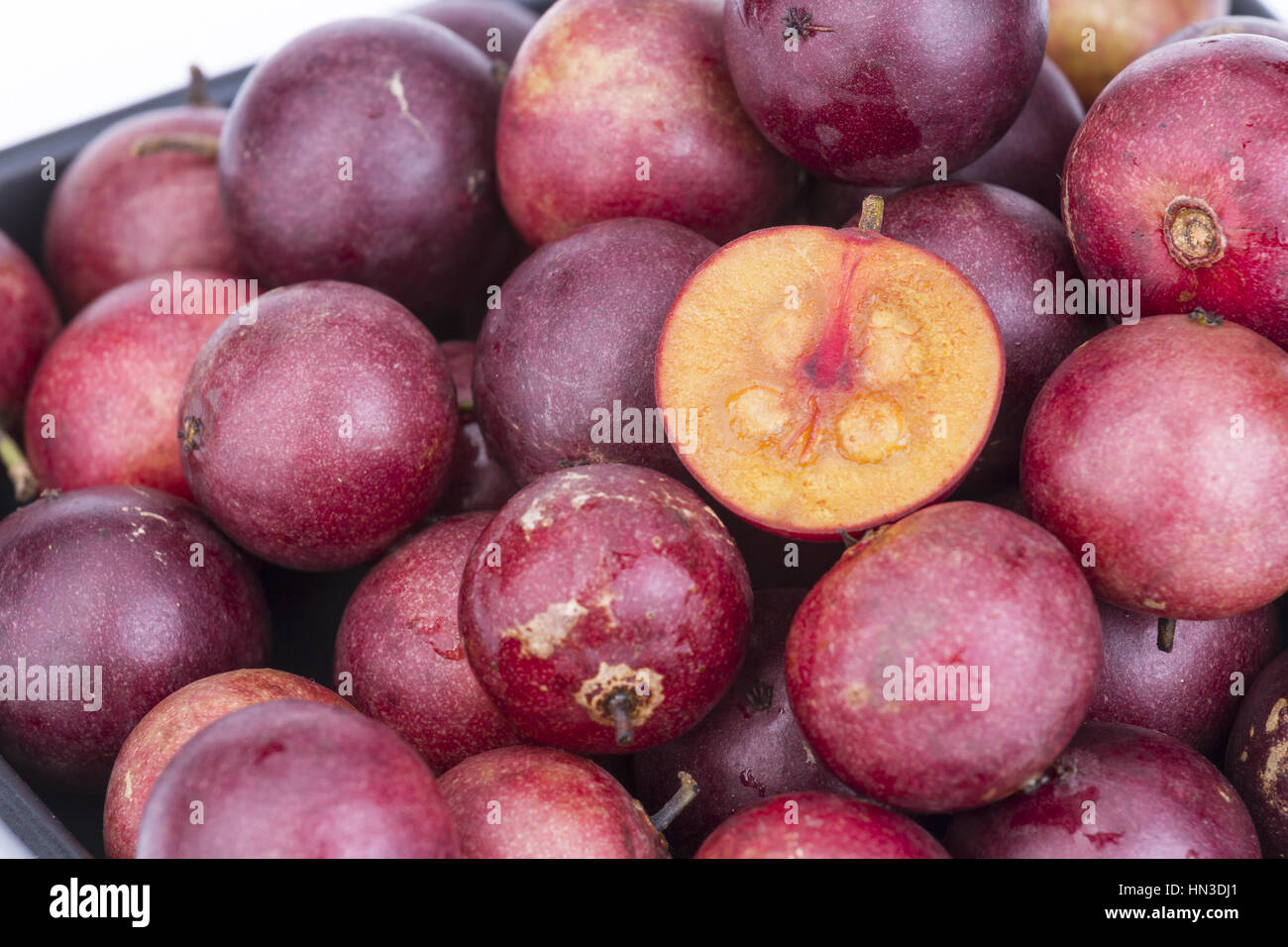 Fruit Ramontchi - Scientific Name is "Flacourtia indica (Burm.f.) Merr." Stock Photo
