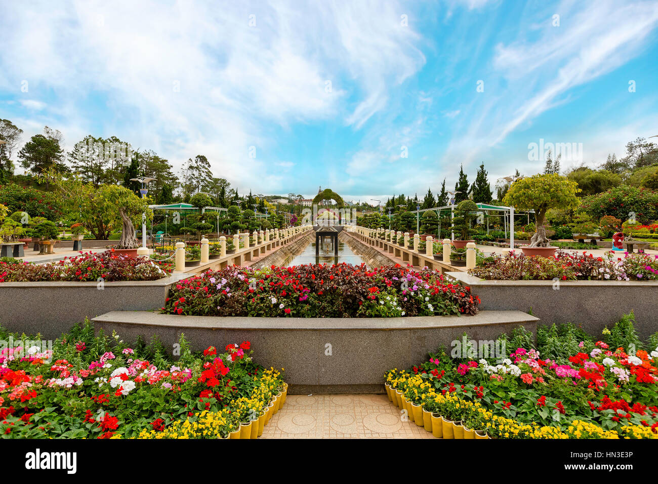 Colorful spring summer park with flowers in sunny day Stock Photo - Alamy