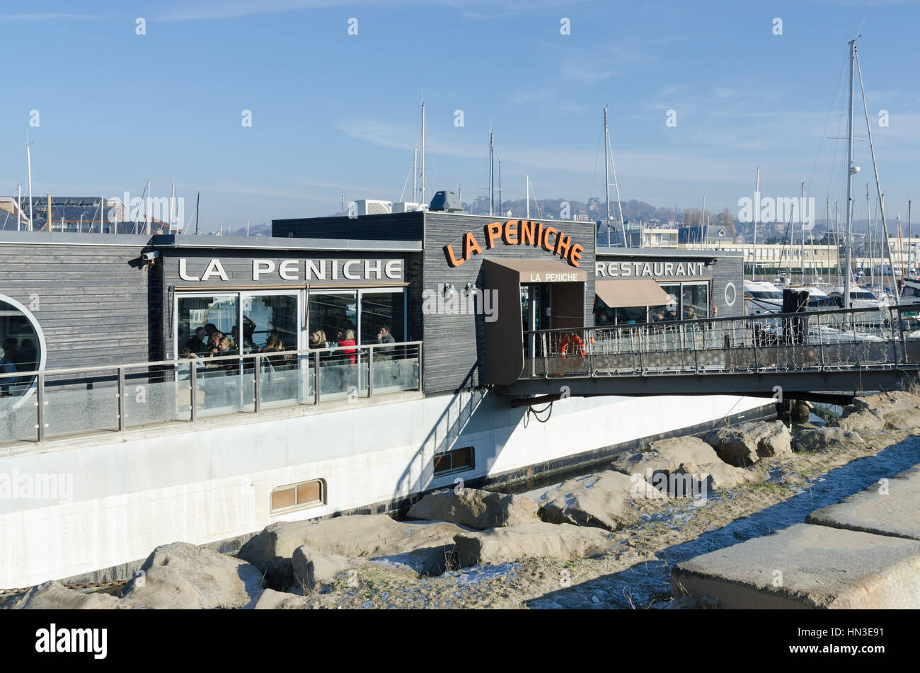 La Peniche floating restaurant in the smart French resort of Deauville in Normandy Stock Photo