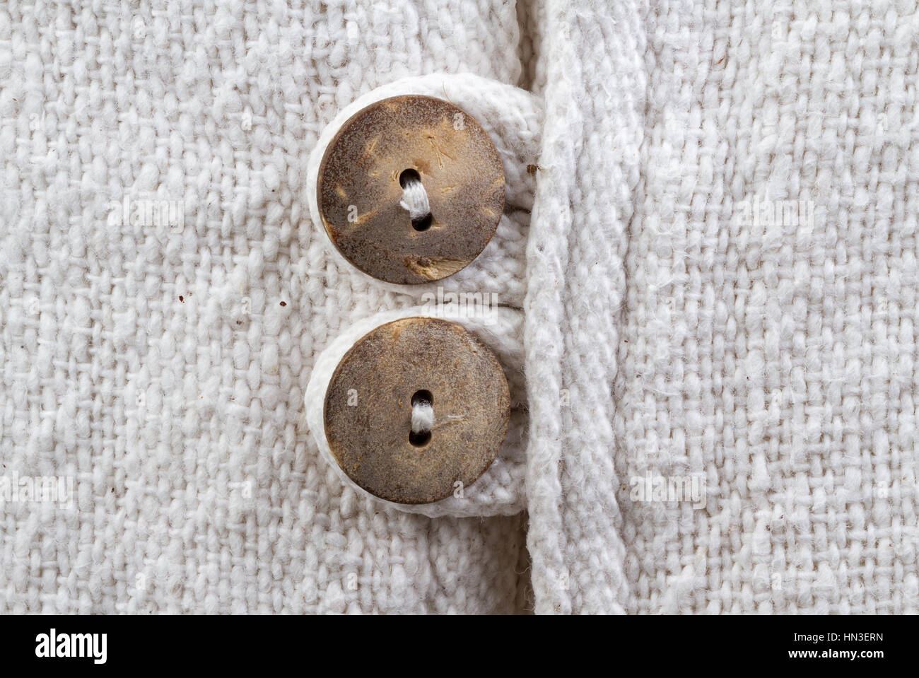 Closed up natural texture cotton fabric with wooden buttons Stock Photo ...