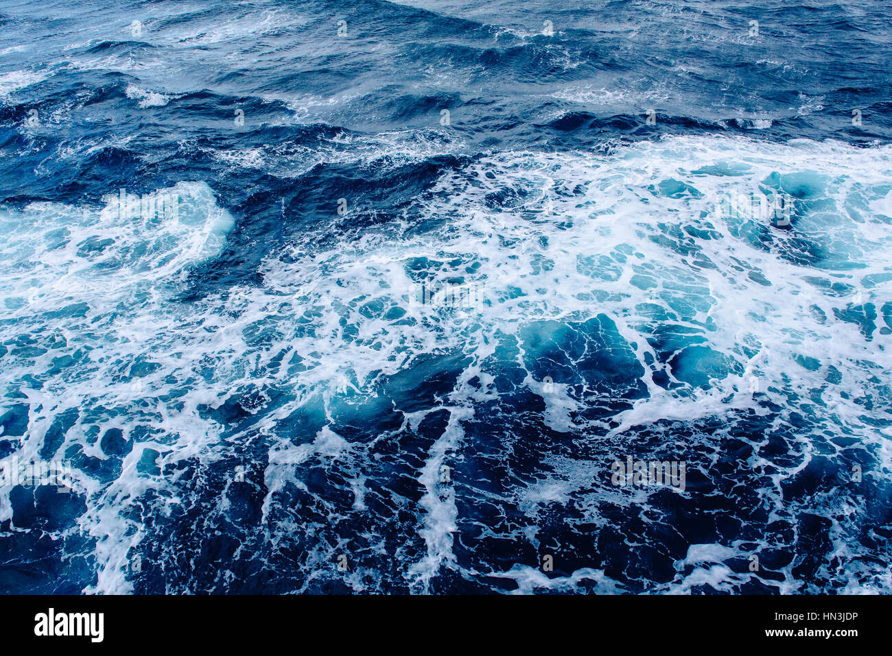 Background blue waves of the sea Stock Photo - Alamy