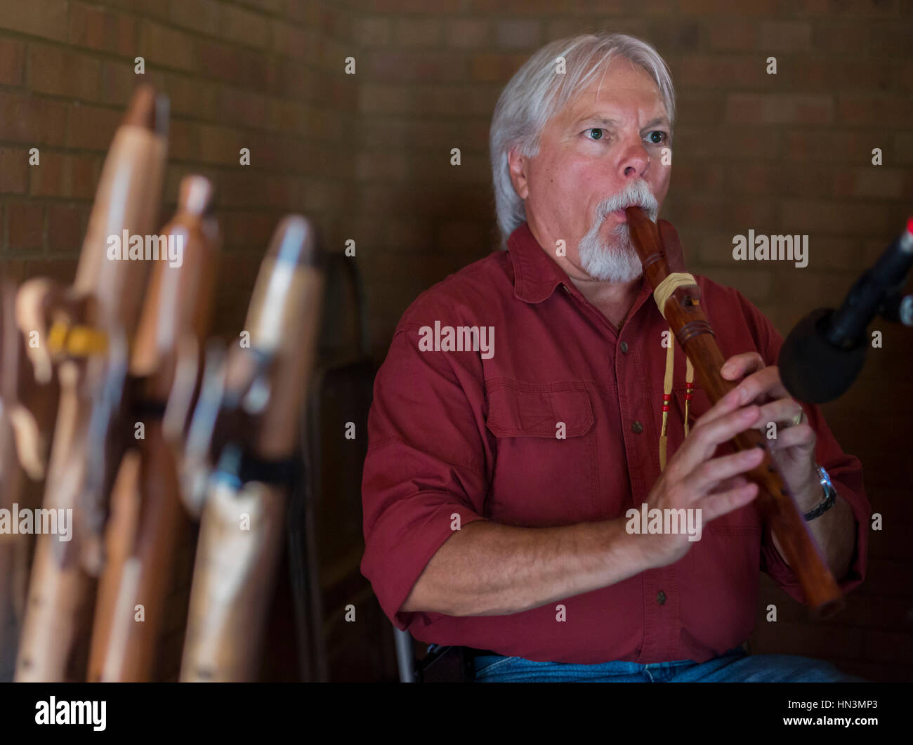 Fort Stanton, New Mexico - Lanny Maddox plays Native American flutes at 'Fort Stanton Live!,' an annual living history program. Stock Photo