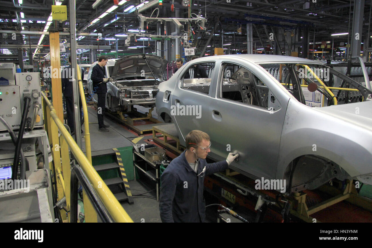 Workers on the Lada production line in the Russian car manufacturer