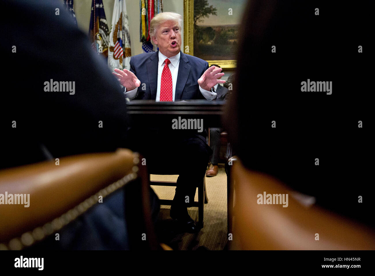 U.S. President Donald Trump speaks as he meets with county sheriffs ...