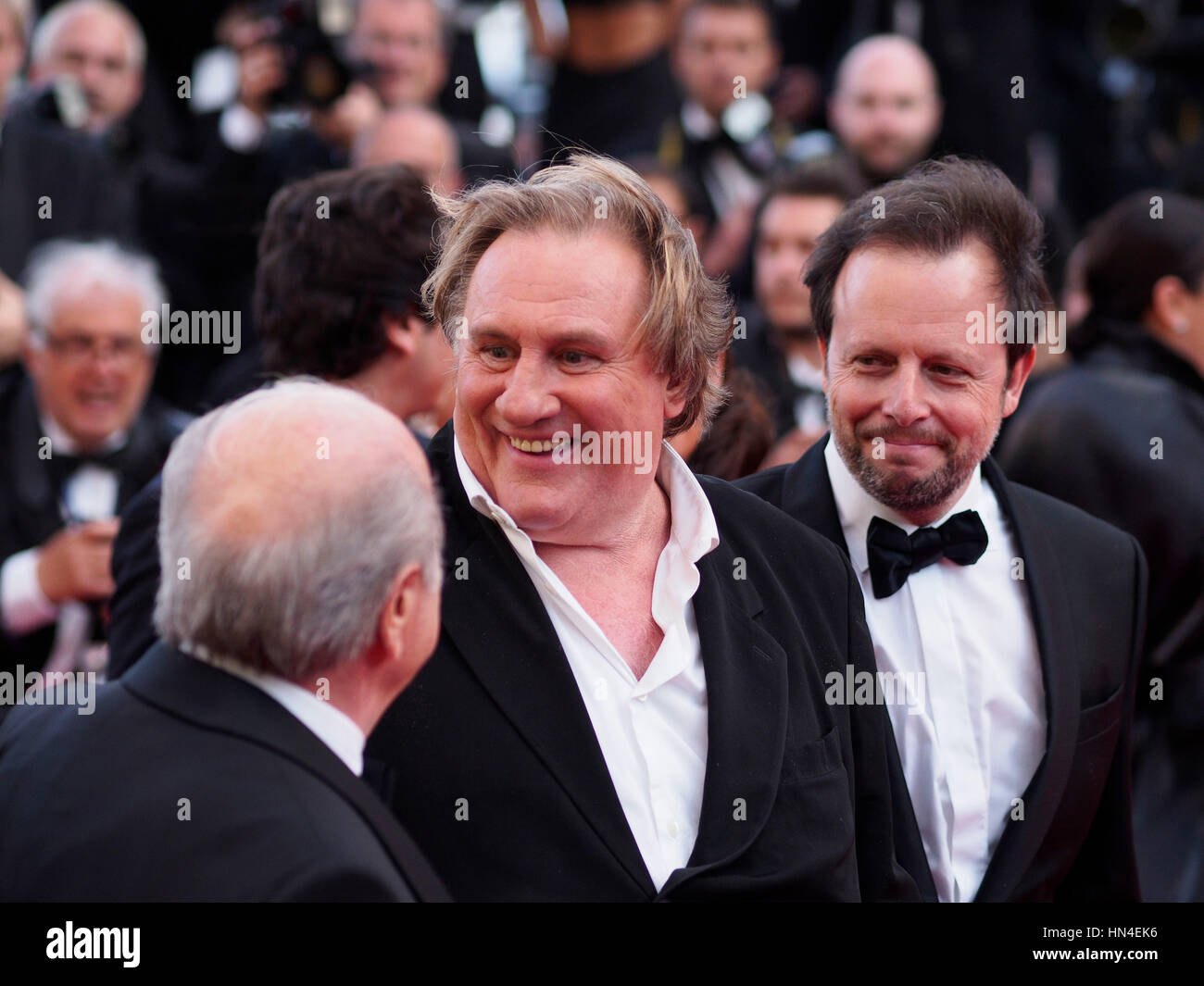 FIFA President Sepp Blatter, Gerard Depardieu and director Frederic Auburtin attend the premiere of The Homesman at the Cannes Film Festival on May 18, 2014, in Cannes, France.  Photo by Francis Specker Stock Photo