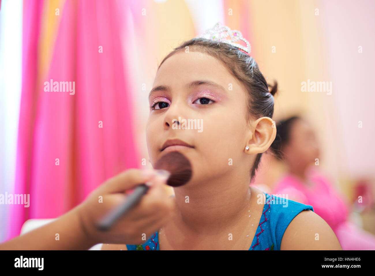 doing princess make up for small kid girl Stock Photo