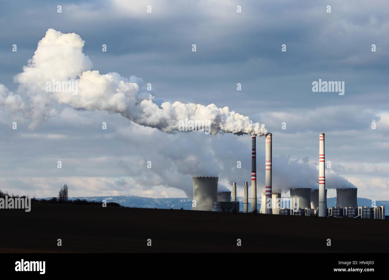 huge smoke from brown coal power plant factory Stock Photo