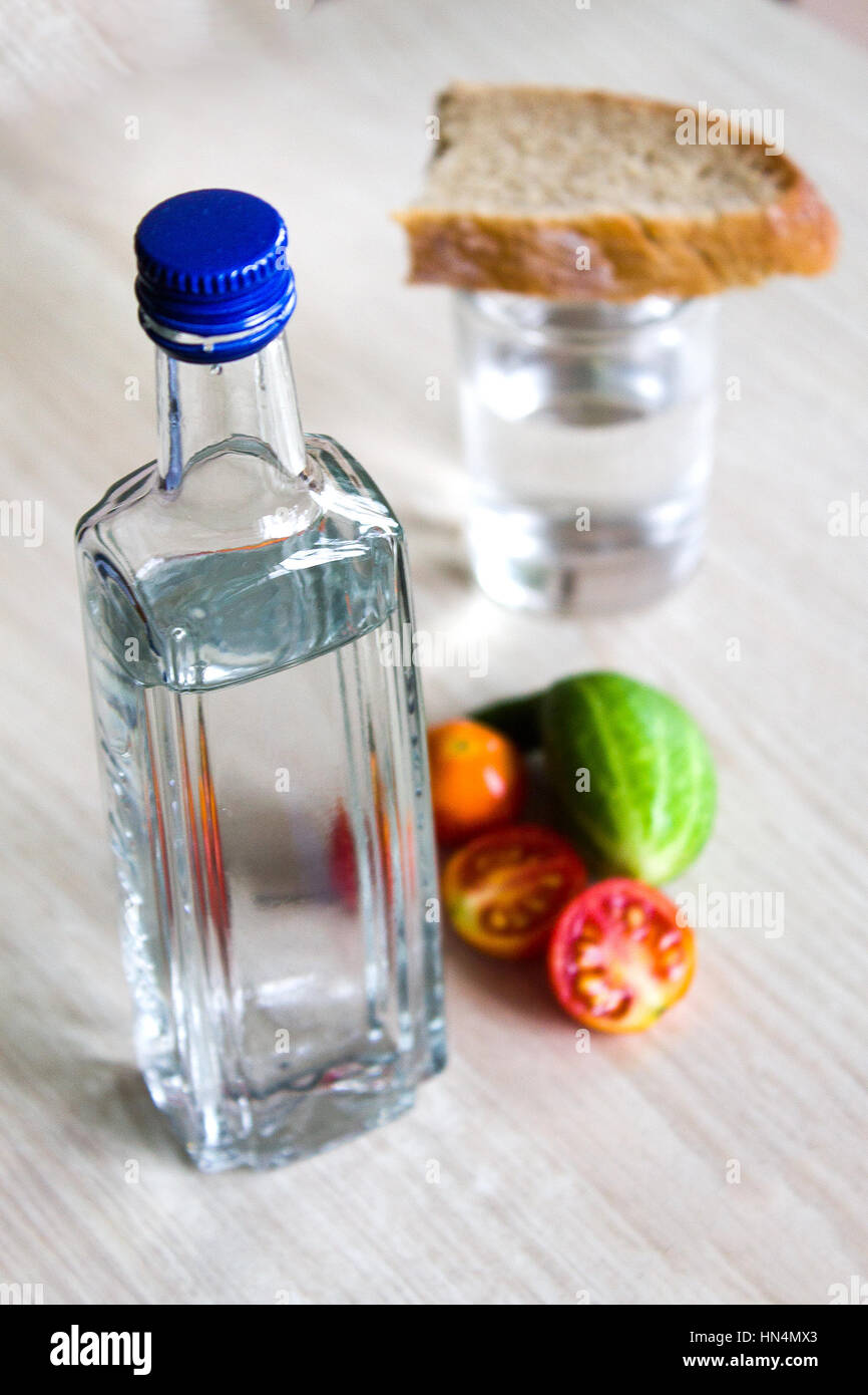 The Russian vodka, national strong alcoholic drink, is used on various celebrations. Photo can be used in various social purposes for example about ha Stock Photo