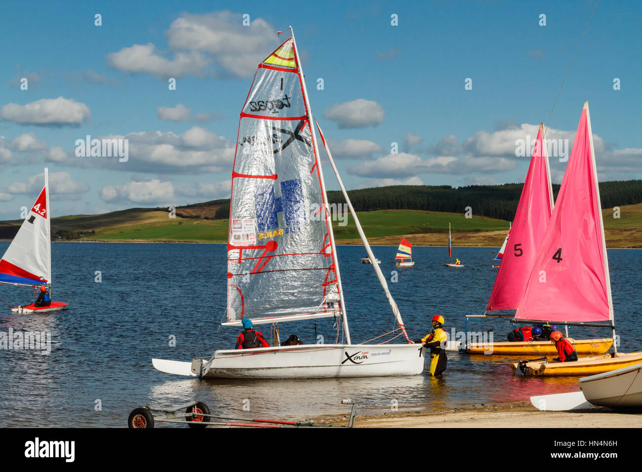 Sailing dinghies or yachts on Llyn Brenig Reservoir in North Wales