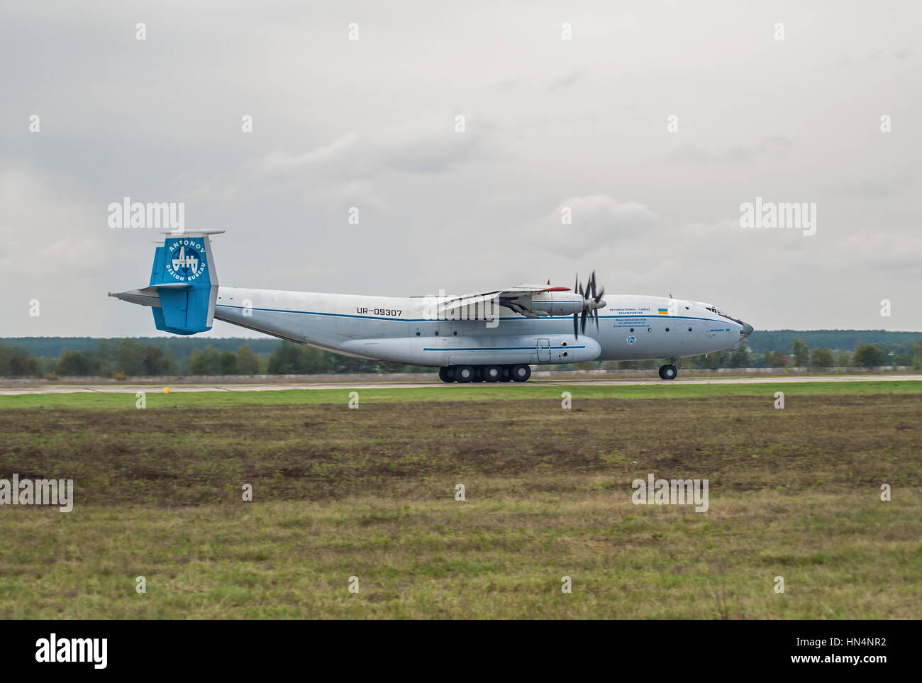 Kiev Region, Ukraine - September 25, 2008: Antonov An-22 turboprop cargo plane is taking off from the runway Stock Photo