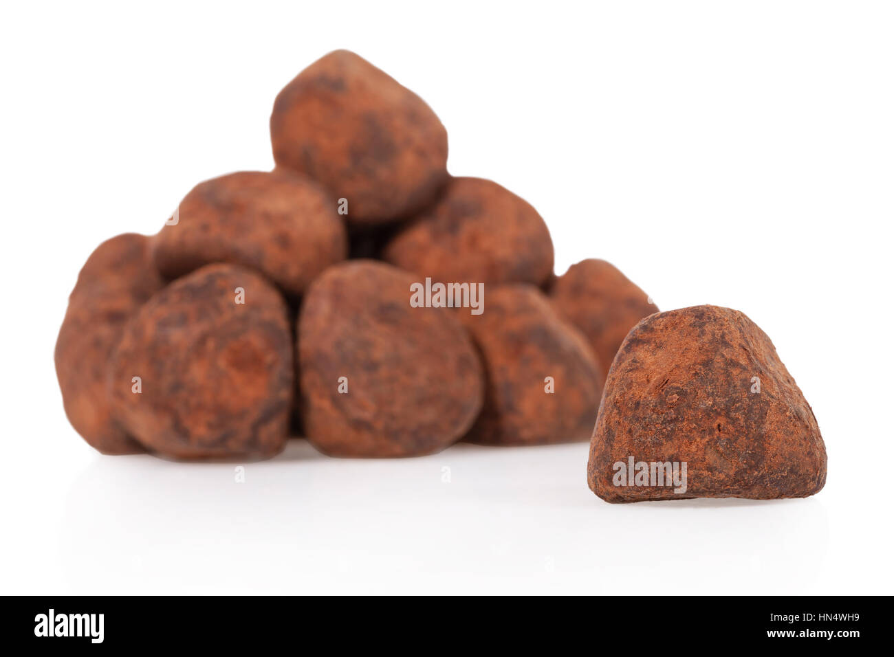 Chocolate truffles isolated on white background Stock Photo