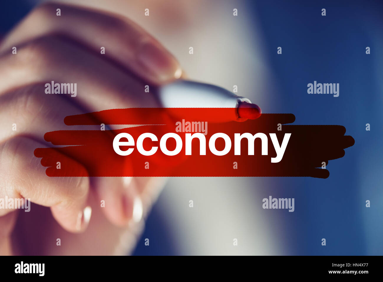 Business and economy concept, businesswoman highlighting word Stock Photo