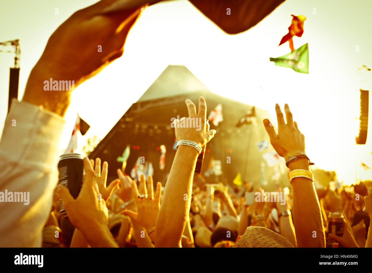 Point of view within a crowd of music fans during a performance at a music festival Stock Photo