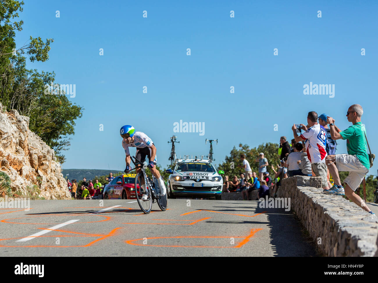 Col du Serre de Tourre,France - July 15,2016: The British cyclist Adam Yates of Orica-BikeExchange Team, in White Jersey, is riding during an individu Stock Photo