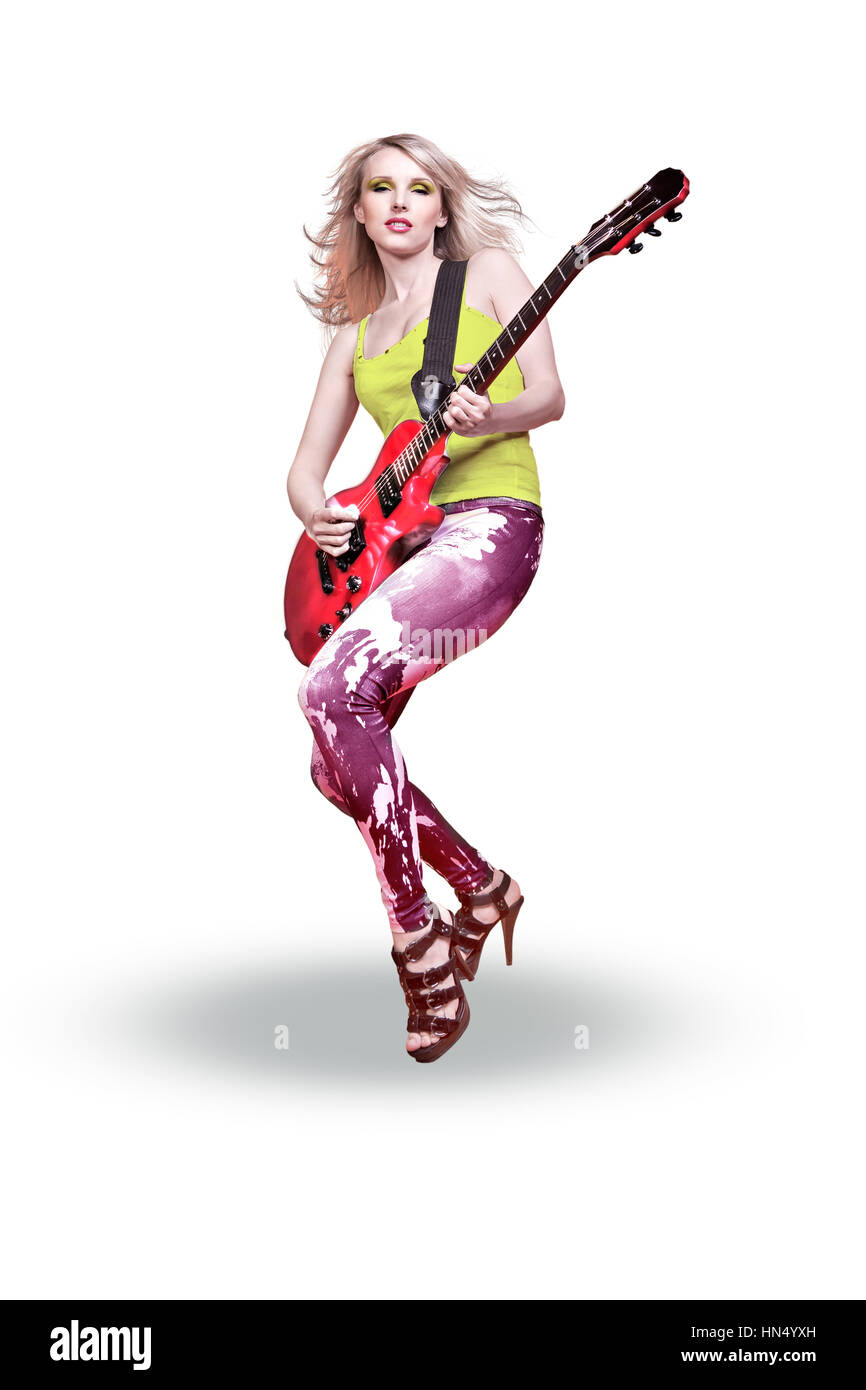 portrait of young woman with a guitar on the stage Stock Photo