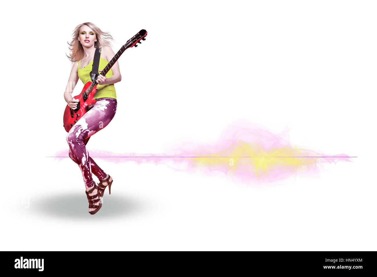 portrait of young woman with a guitar on the stage Stock Photo