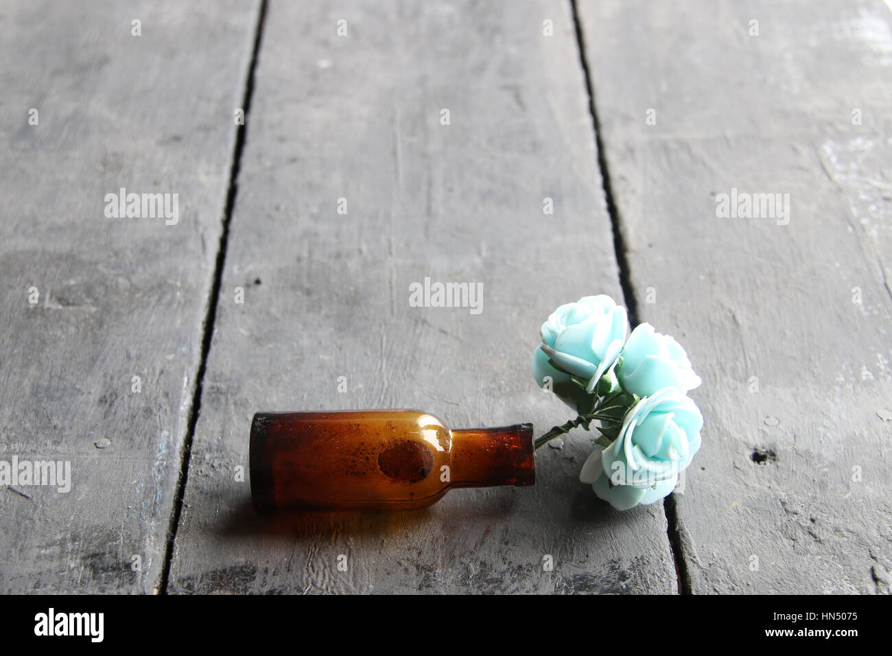 flowers in a in old vintage bottle Stock Photo
