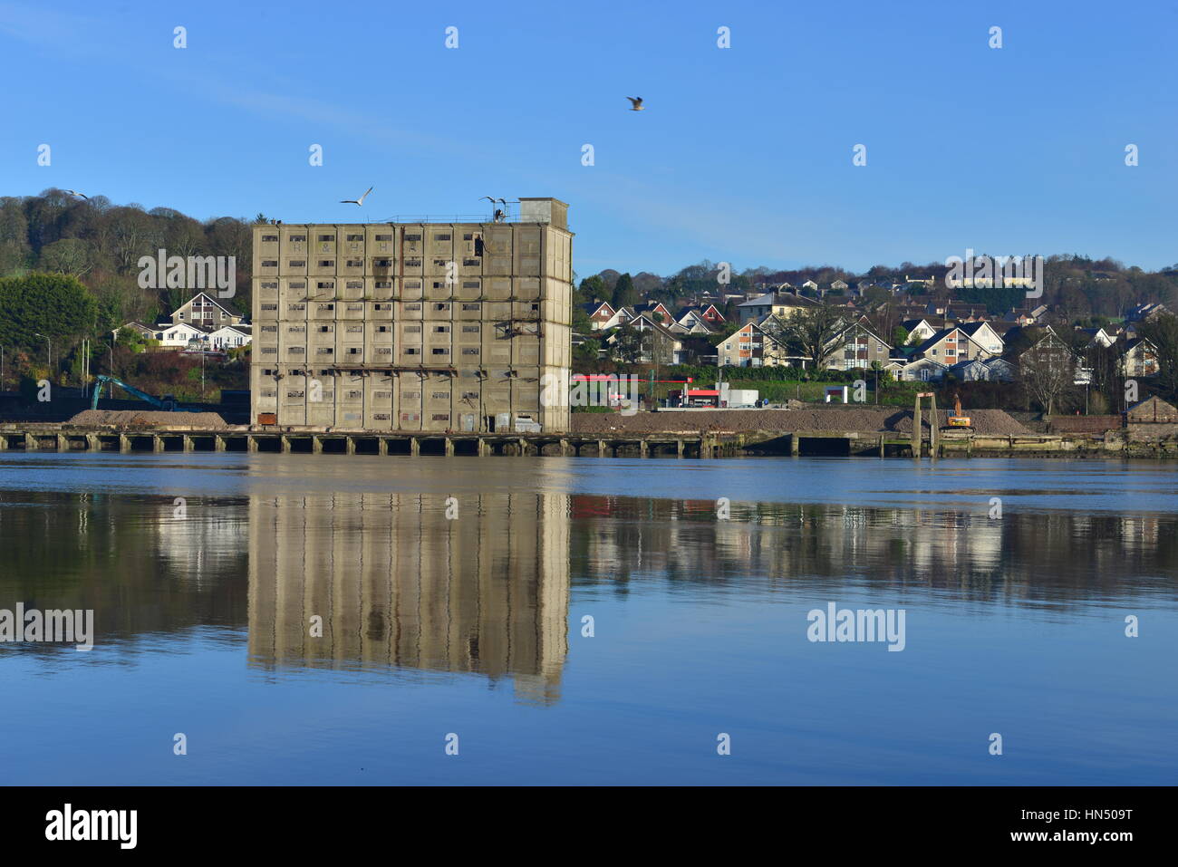 An abandoned river warehouse at Waterford city in Ireland Stock Photo