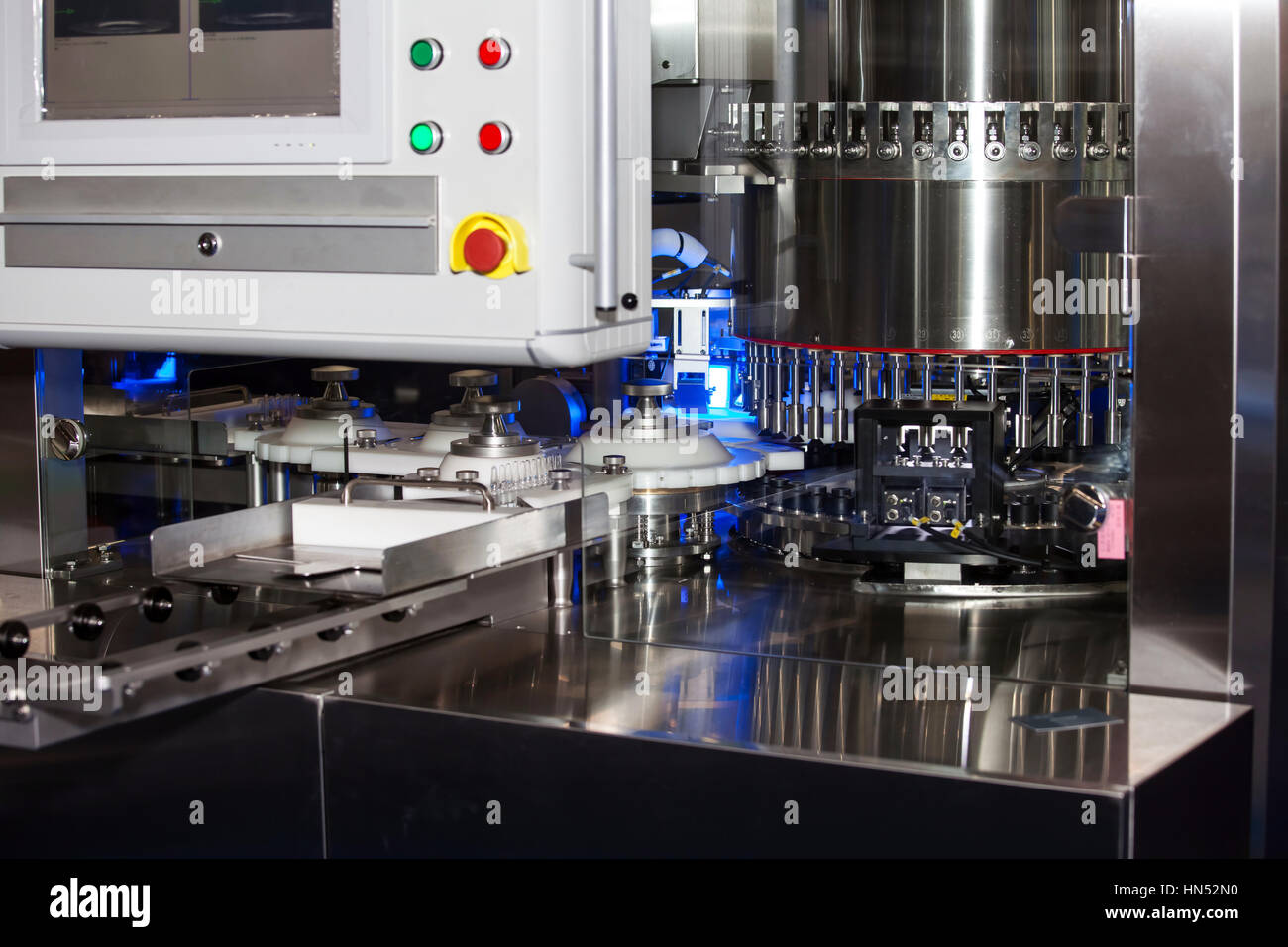 Ampoule filling and sealing machine Stock Photo Alamy