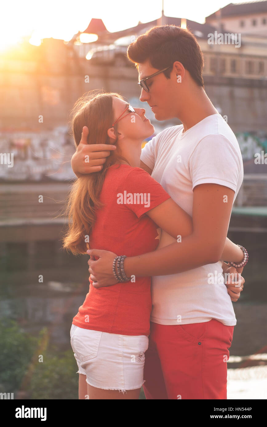 Adorable romantic couple on a sunny day in the city Stock Photo