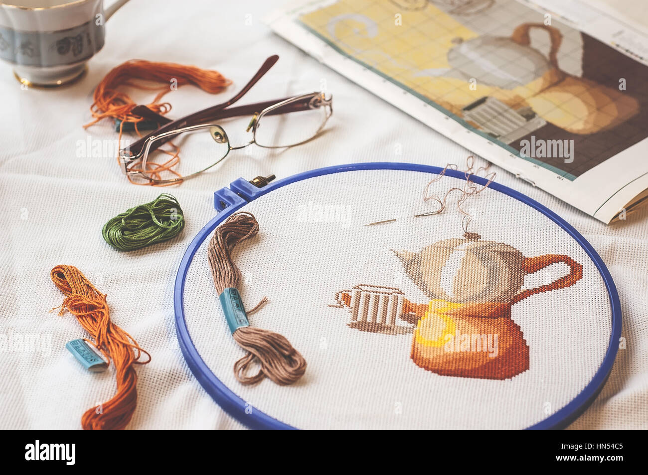 Cross-Stitch Set with printed canvas, needle and floss thread. Embroidery,  Hobbies and entertainment Stock Photo - Alamy