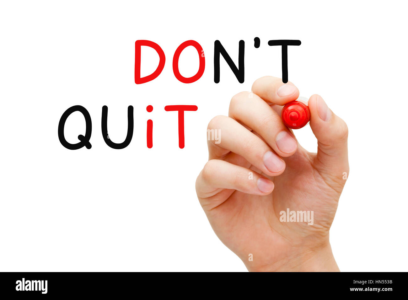 Hand writing Do Not Quit, Do It concept with marker on transparent glass board. Stock Photo