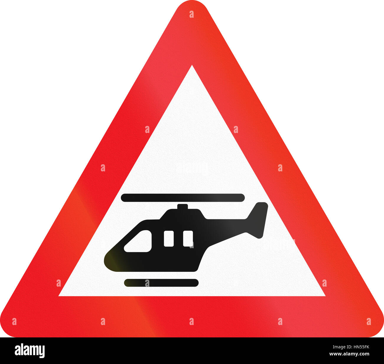 Warning road sign used in Denmark Lowflying helicopters Stock Photo