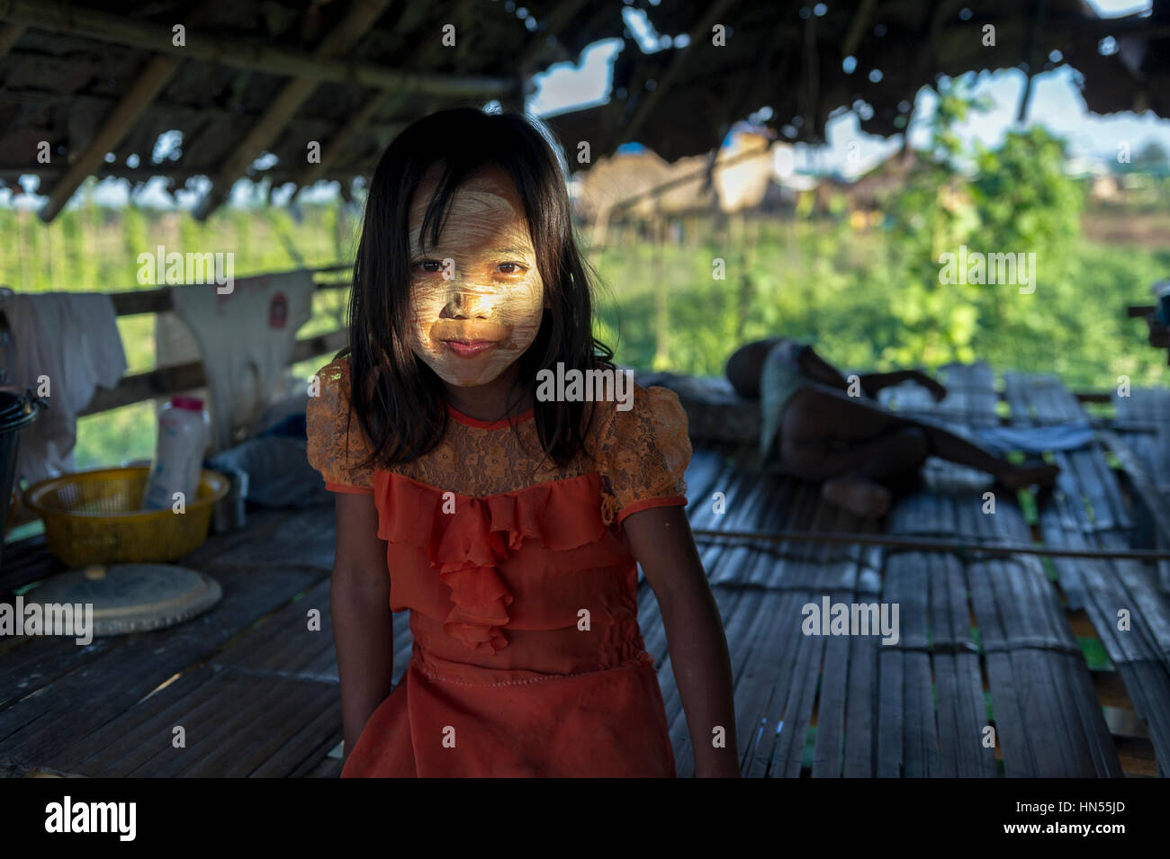 Myanmar (formerly Burma). Kayin State (Karen State). Hpa An. Peasant  village. Portrait of a young girl covered of thanaka Stock Photo - Alamy