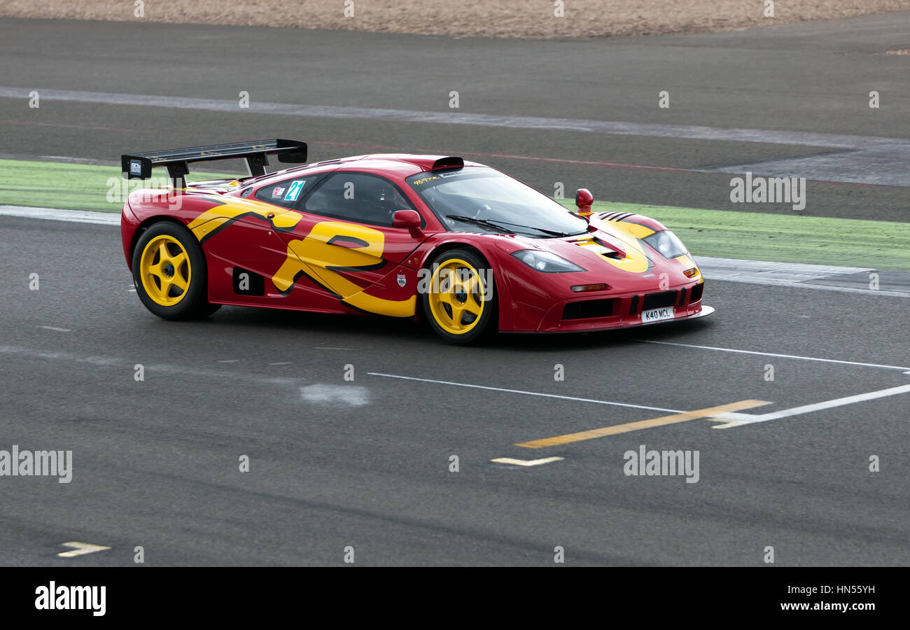 A 1995, Red and Yellow, McLaren F1 GTR during the 90's Endurance legends demonstration at the 2016 Silverstone Classic Stock Photo