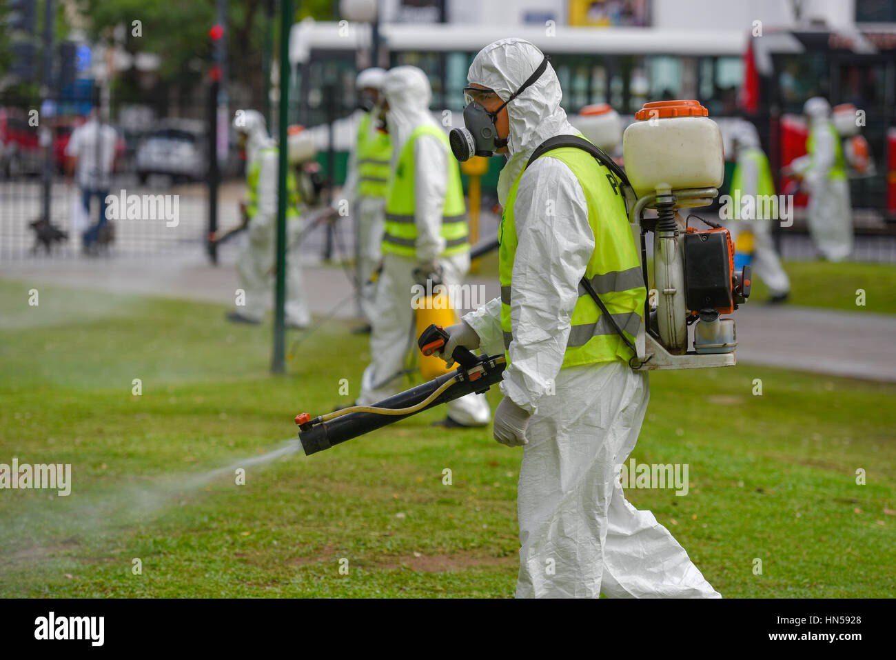 Buenos Aires, Argentina - March 3, 2016: Employees of the Ministry of Environment and Public Space fumigate for Aedes aegypti mosquitos. Stock Photo