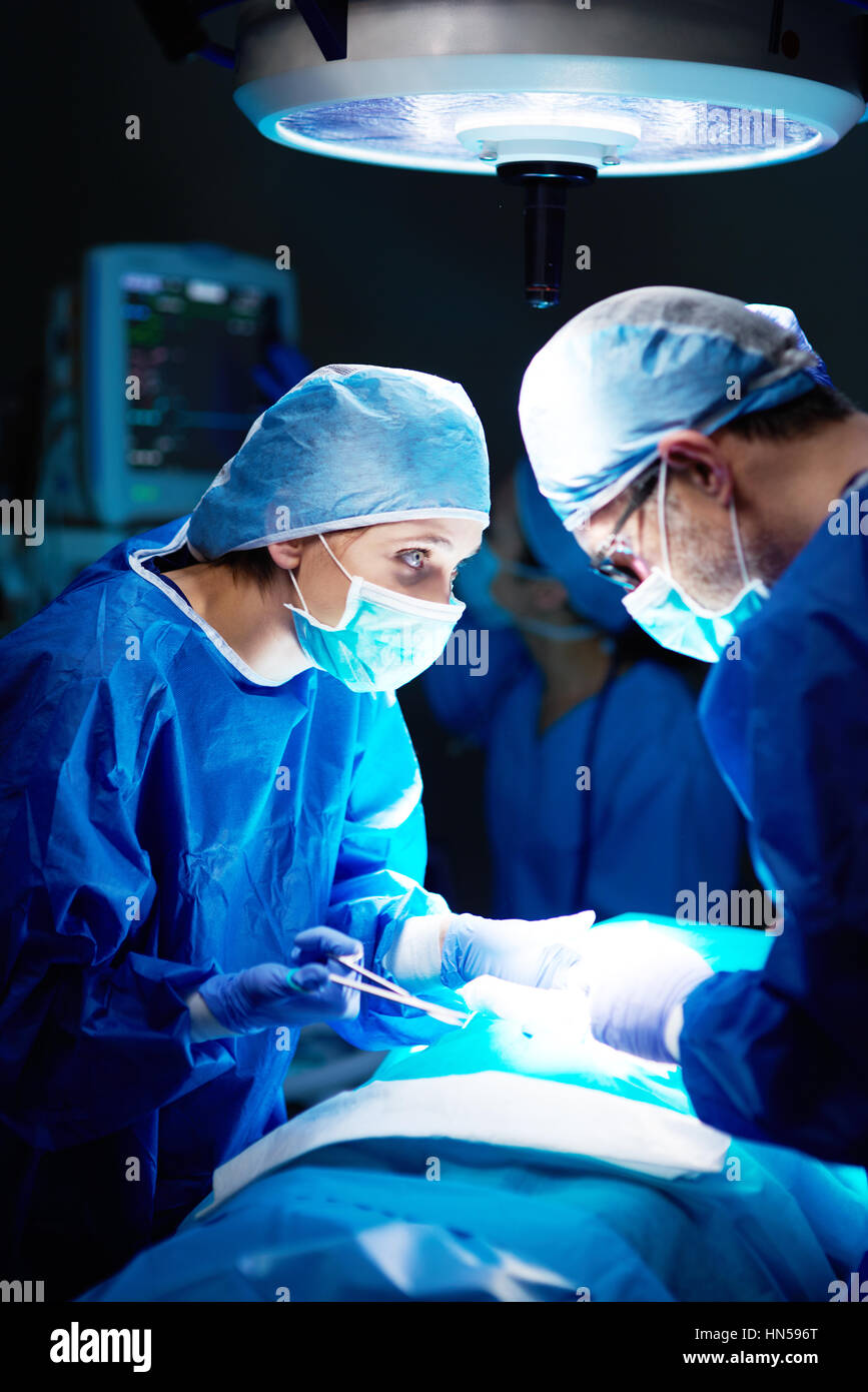 Close up on the focus surgeons Stock Photo - Alamy
